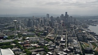 AX45_069E - 5K aerial stock footage of the Space Needle and skyscrapers in Downtown Seattle, Washington