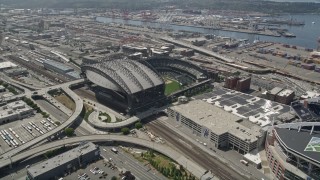 AX45_093 - 5K aerial stock footage approaching Safeco Field, tilting to bird's eye of baseball field, Downtown Seattle, Washington