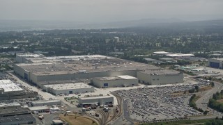 AX45_136 - 5K stock footage aerial video of the Boeing Everett Factory at Paine Field, Washington