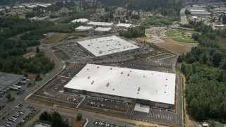 AX46_004 - 5K aerial stock footage fly over a pair of large warehouse buildings in Lynnwood, Seattle, Washington