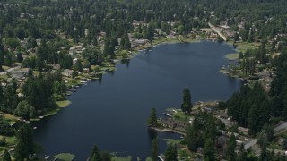 AX46_006E - 5K stock footage aerial video flyby lakefront homes around Lake Serene, Lynnwood, Washington