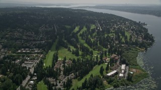 AX46_016 - 5K aerial stock footage tilting to a bird's eye view of Inglewood Golf Club by Lake Washington, Kenmore, Washington