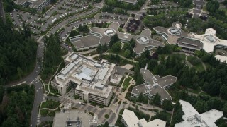 AX46_029E - 5K aerial stock footage approaching and tilting to bird's eye view of Microsoft Headquarters, Redmond, Washington