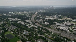 AX46_036 - 5K aerial stock footage of State Route 520 and office buildings at Microsoft Headquarters, Redmond, Washington