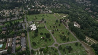 AX46_042 - 5K aerial stock footage tilting to a bird's eye view of a cemetery and funeral home,  Bellevue, Washington