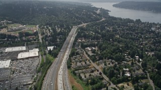 AX46_044 - 5K stock footage aerial video fly over I-405 and a suburban community toward Lake Washington, Bellevue, Washington