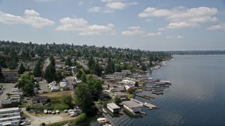 AX46_053 - 5K aerial stock footage fly by lakeside homes with docks on Lake Washington, Renton, Washington