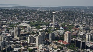 AX47_047 - 5K aerial stock footage of Space Needle and nearby high-rise buildings, Downtown Seattle, Washington