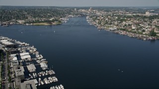 AX47_064E - 5K aerial stock footage fly over marinas and Lake Union, with boats in the water, Seattle, Washington