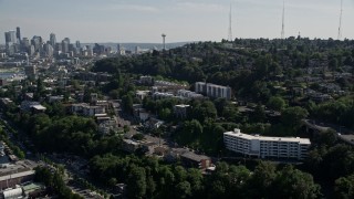 AX47_068 - 5K aerial stock footage approach and fly over bridge spanning Lake Union, reveal Downtown Seattle skyline, Washington