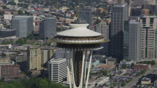 AX47_127 - 5K aerial stock footage of orbiting around the top of the Space Needle in Downtown Seattle, Washington