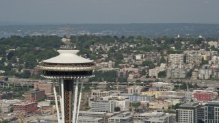 AX47_130E - Aerial stock footage of 5K aerial  video orbit around the top of the Space Needle, Downtown Seattle, Washington