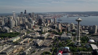 AX47_133 - 5K aerial stock footage of the world famous Seattle Space Needle and skyscrapers in Downtown Seattle, Washington