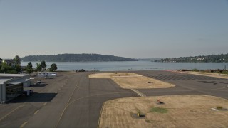 AX48_001 - 5K aerial stock footage lift off from Renton Municipal Airport and fly over Lake Washington, Seattle, Washington