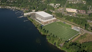 AX48_004 - 5K aerial stock footage of athletic center and sports fields by the shore of Lake Washington in Renton, Washington