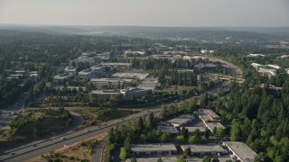 AX49_036E - 5K aerial stock footage of flying by Microsoft Headquarters, Redmond, Washington