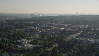 AX49_042 - 5K aerial stock footage of reverse view of Microsoft Headquarters office complex in Redmond, Washington