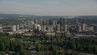 AX49_049E - 5K aerial stock footage of Downtown Bellevue city buildings seen from north of the city, Washington