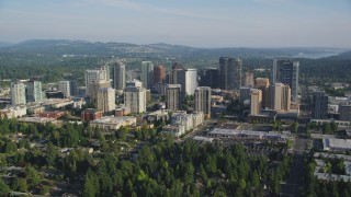 AX49_050 - 5K stock footage aerial video of flying by skyscrapers and high-rises, Downtown Bellevue, Washington
