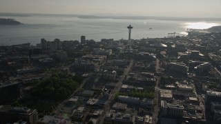 AX49_060 - 5K aerial stock footage approach the world famous Space Needle in Downtown Seattle, Washington, with Elliott Bay in the background