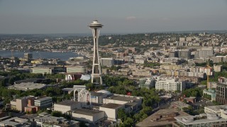 AX49_070E - 5K aerial stock footage approach the Space Needle and Seattle Center from Elliott Bay, orbit to reveal Downtown Seattle, Washington