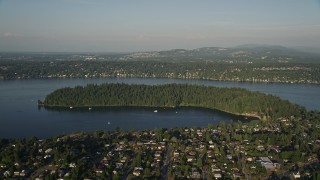 AX49_097 - 5K aerial stock footage of Andrews Bay and the Bailey Peninsula in Lake Washington