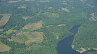 AX52_014 - 5K aerial stock footage fly away from farms, fields, and Mayfield Lake, Silver Creek, Washington