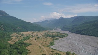 AX52_032 - 5K stock footage aerial video of follow North Fork Toutle River toward Mt. St. Helens, Washington