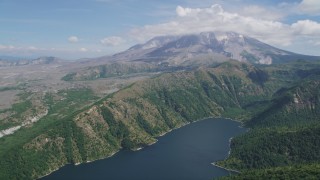 AX52_042 - 5K stock footage aerial video fly over Castle Lake to approach Mount St. Helens, Washington