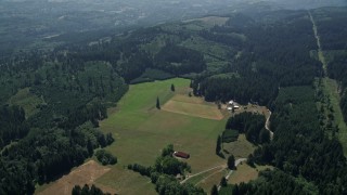 AX52_067 - 5K aerial stock footage of farms and farm fields in Amboy, Washington