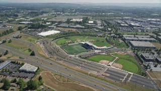 AX52_114 - 5K aerial stock footage approach a multi-sport stadium in Hillsboro, Oregon