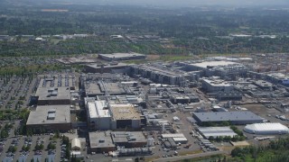 AX52_115 - 5K stock footage aerial video of approaching Intel Ronler Acres campus in Hillsboro, Oregon