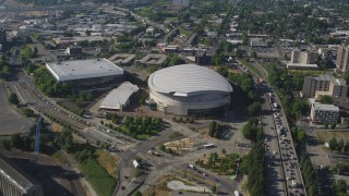 AX53_021 - 5K aerial stock footage of approaching Memorial Coliseum and Moda Center, Lloyd District, Northeast Portland, Oregon