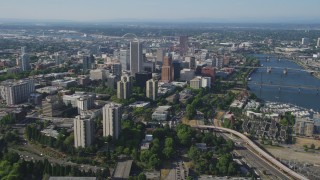 AX53_031 - 5K aerial stock footage of approaching skyscrapers and city buildings, Downtown Portland, Oregon