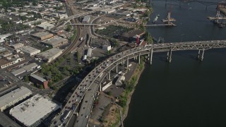 AX53_046 - 5K aerial stock footage tilt to bird's eye of Marquam Bridge with heavy traffic, Portland, Oregon