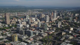 AX53_052 - 5K aerial stock footage of approaching city skyscrapers and high-rises, Downtown Portland, Oregon