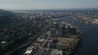 AX53_058 - 5K stock footage aerial video fly by high-rise district revealing cityscape, South Waterfront and Downtown Portland, Oregon