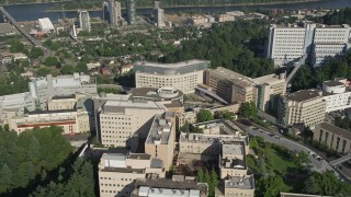AX53_068 - 5K aerial stock footage of flying by Oregon Health and Science University, Portland, Oregon