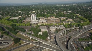 AX53_081 - 5K aerial stock footage of Interstate 5 and 405 interchange pan to Medical Center, North Portland, Oregon