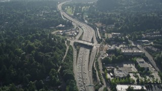 AX53_089E - 5K aerial stock footage fly over heavy highway traffic, Northwest Portland, Oregon