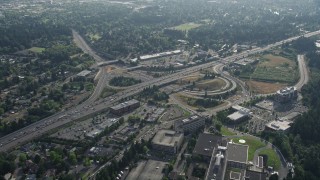 AX53_093E - 5K aerial stock footage of traffic backing up by a freeway interchange, Southwest Portland, Oregon