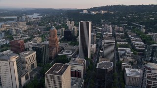 AX54_050 - 5K aerial stock footage of approaching Oregon Health and Science University, Portland, Oregon, sunset
