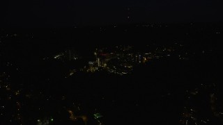 AX55_055 - 5K aerial stock footage of flying by the Oregon Health and Science University, Portland, Oregon, night