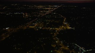 AX55_064 - 5K aerial stock footage of approaching Home Depot and Highway 26 in Southwest Portland, Oregon, night