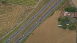 AX56_010 - 5K aerial stock footage of bird's eye view of light traffic on Highway 26, Banks, Oregon