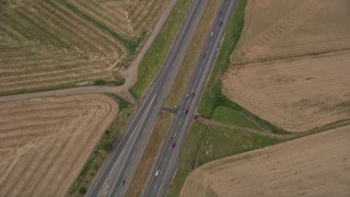 AX56_010E - 5K aerial stock footage of bird's eye view of light traffic traveling on Highway 26, Banks, Oregon