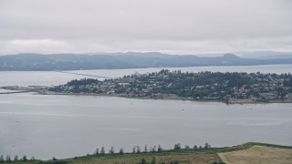 AX56_068 - 5K aerial stock footage of the town of Astoria, Oregon, beside Youngs Bay
