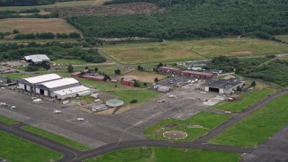 AX56_070 - 5K aerial stock footage of Astoria Regional Airport in Astoria, Oregon