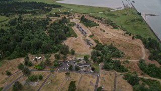 AX56_080 - 5K aerial stock footage fly over the historic Fort Stevens in Oregon