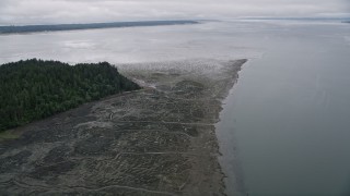AX56_151 - 5K aerial stock footage of marshy island shore on Long Island, Washington